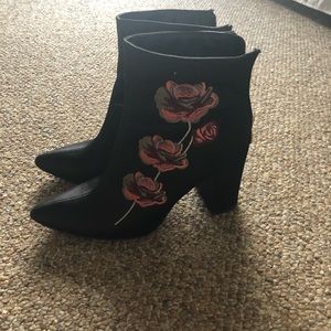 Black booties with rose detail